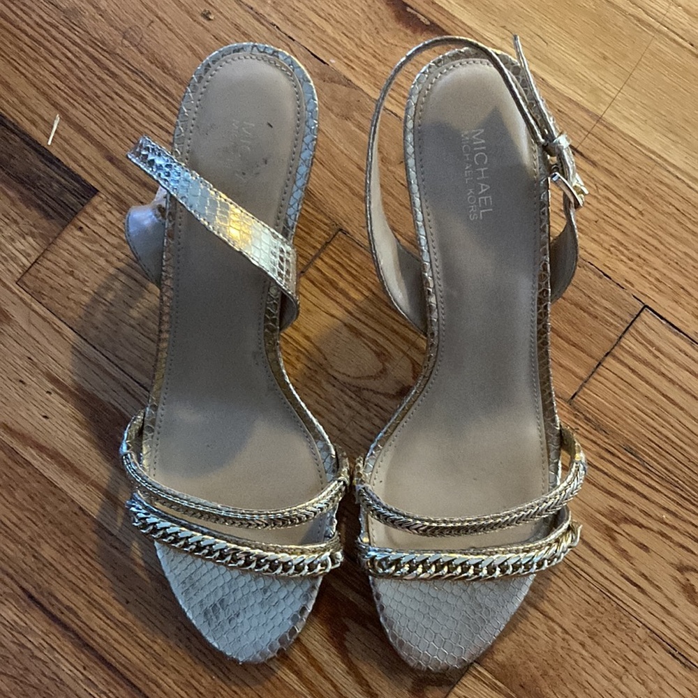 Yellow gold Michael Kors heels. Size 9. The heel is low and comfortable
